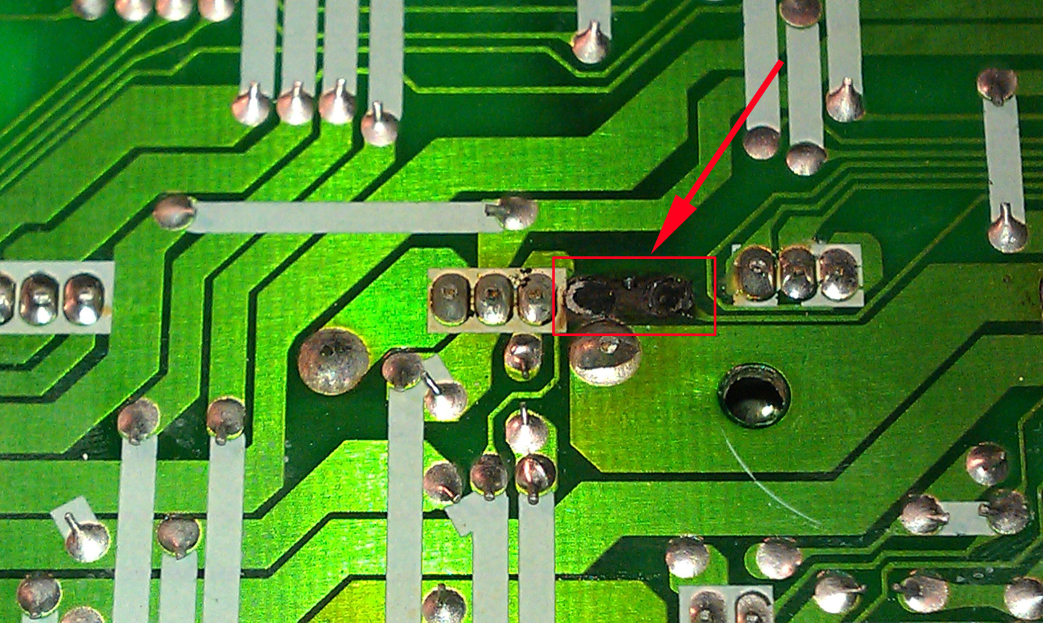 nutone ima3303 burnt resistor pads close up.jpg